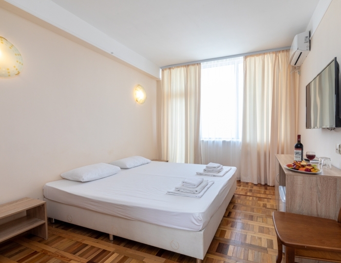 Стандарт коннект 4-местный 2-комнатный - Отель «Апсны» Гудаута